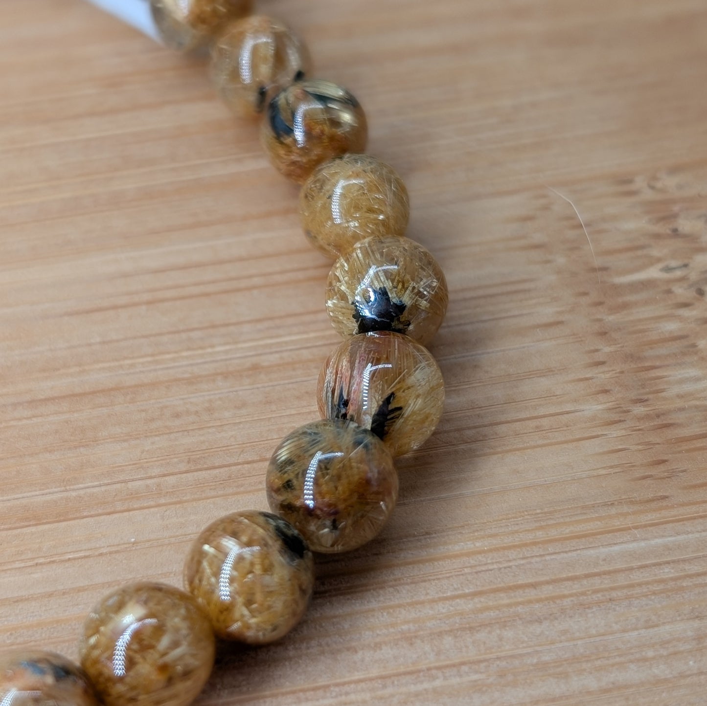 Goldener Rutilquarz und Hämatit Armband 6 mm