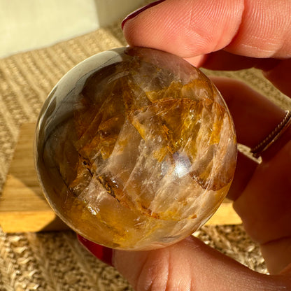 Stern Feuerquarz Golden Healer Kugel [ZT]